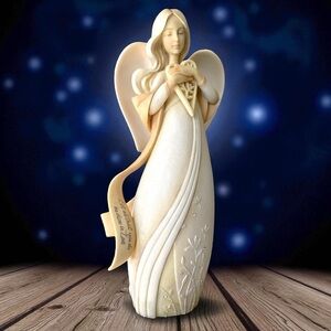 Enesco Foundation Love angle, resin, lovely, and in perfect condition